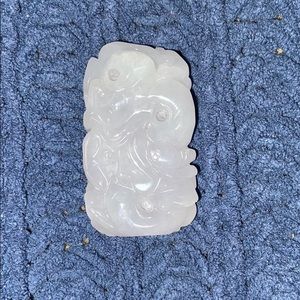Natural carved jade pendant